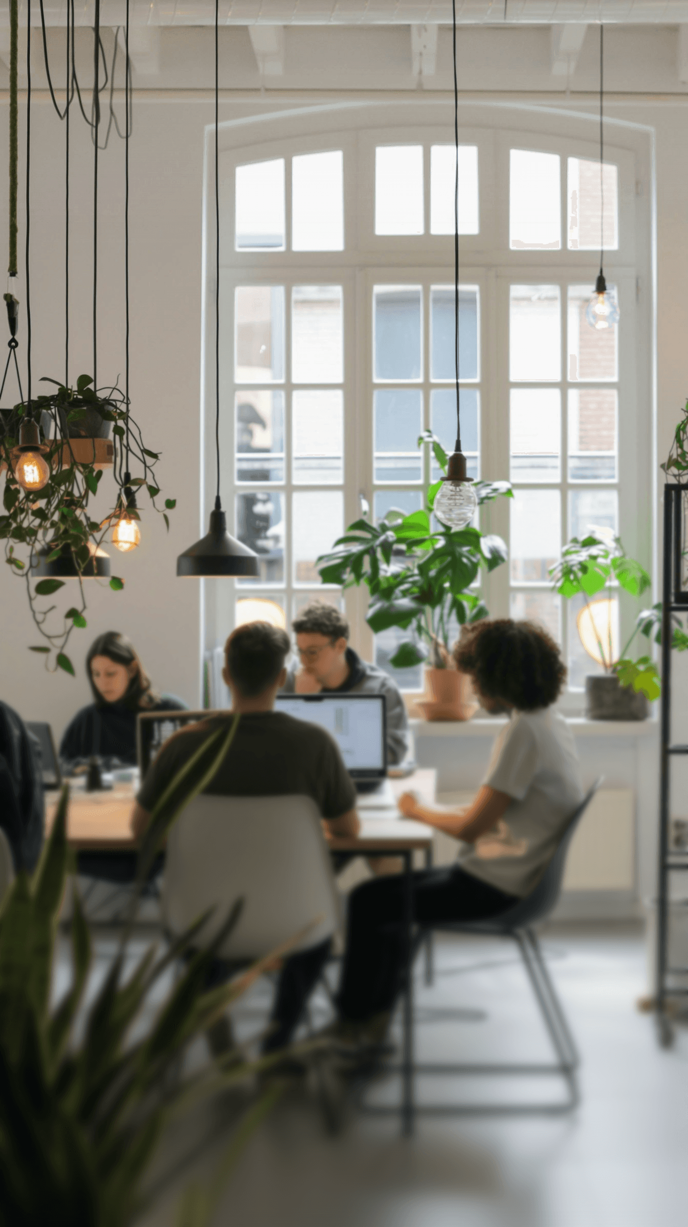 Team working at the table in well lit office